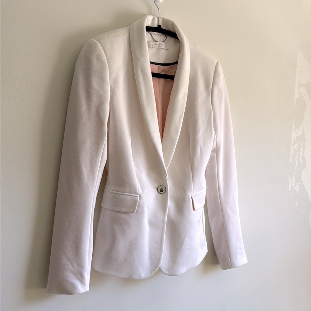 Reserved Jacket size 0
Sophisticated White Blazer with Shawl Collar